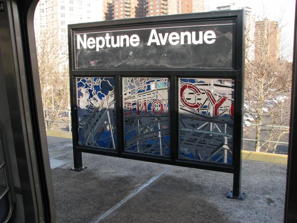 Stained glass sign at Neptune Av on F line