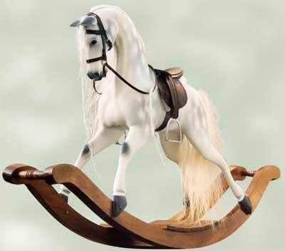 http://i230.photobucket.com/albums/ee307/edgarblythe/dapple-rocking-horse-400.jpg